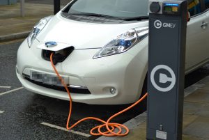 A Nissan Leaf car using an electric re-charging point on July 29th, 2016, in Stockport, England. (Photo by Jonathan Nicholson/NurPhoto via Getty Images)